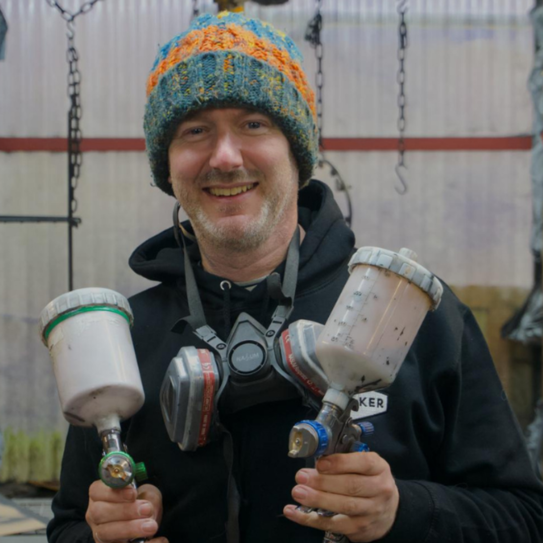 Mark posing in the Firemaker workshop