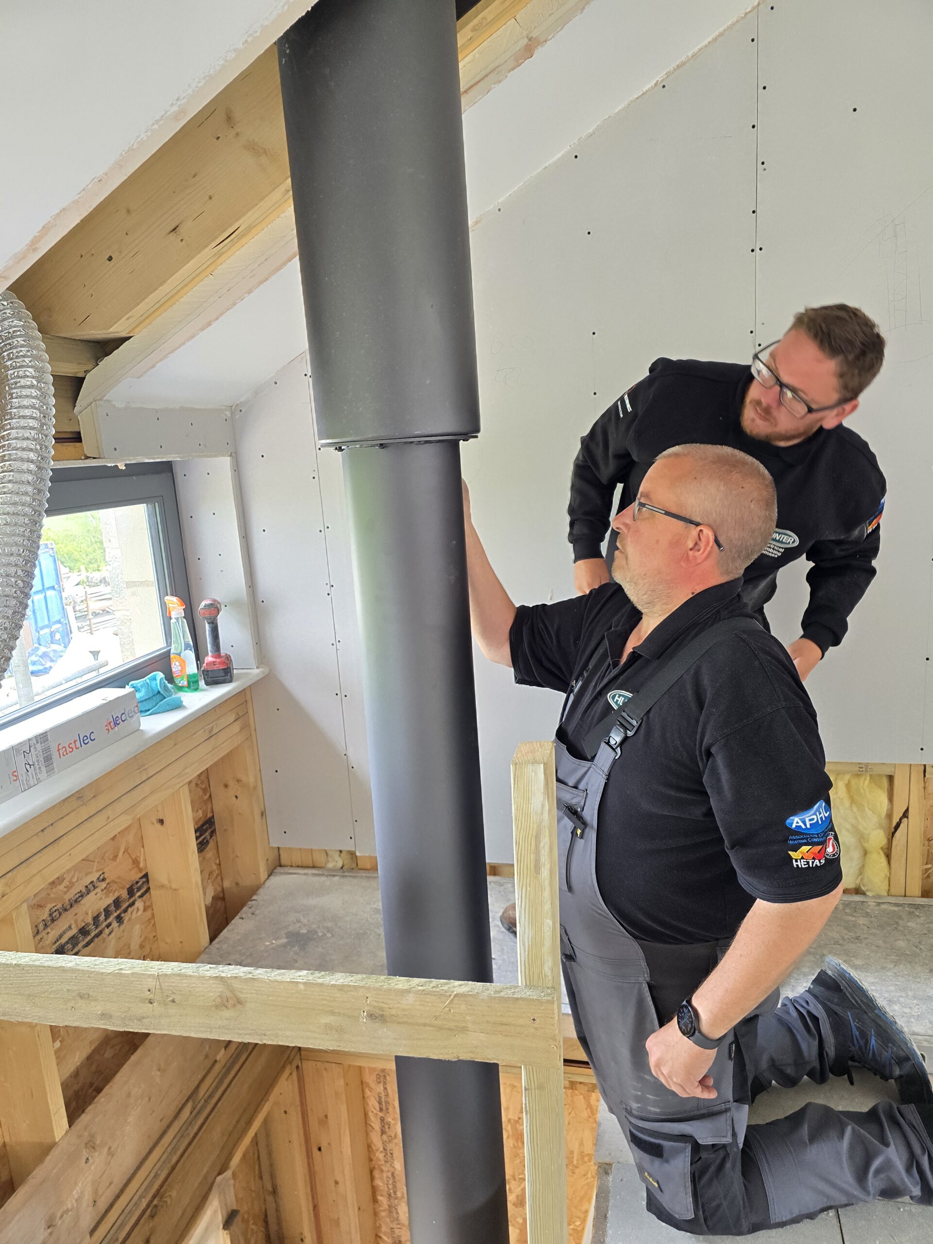 image of two men installing a firebob